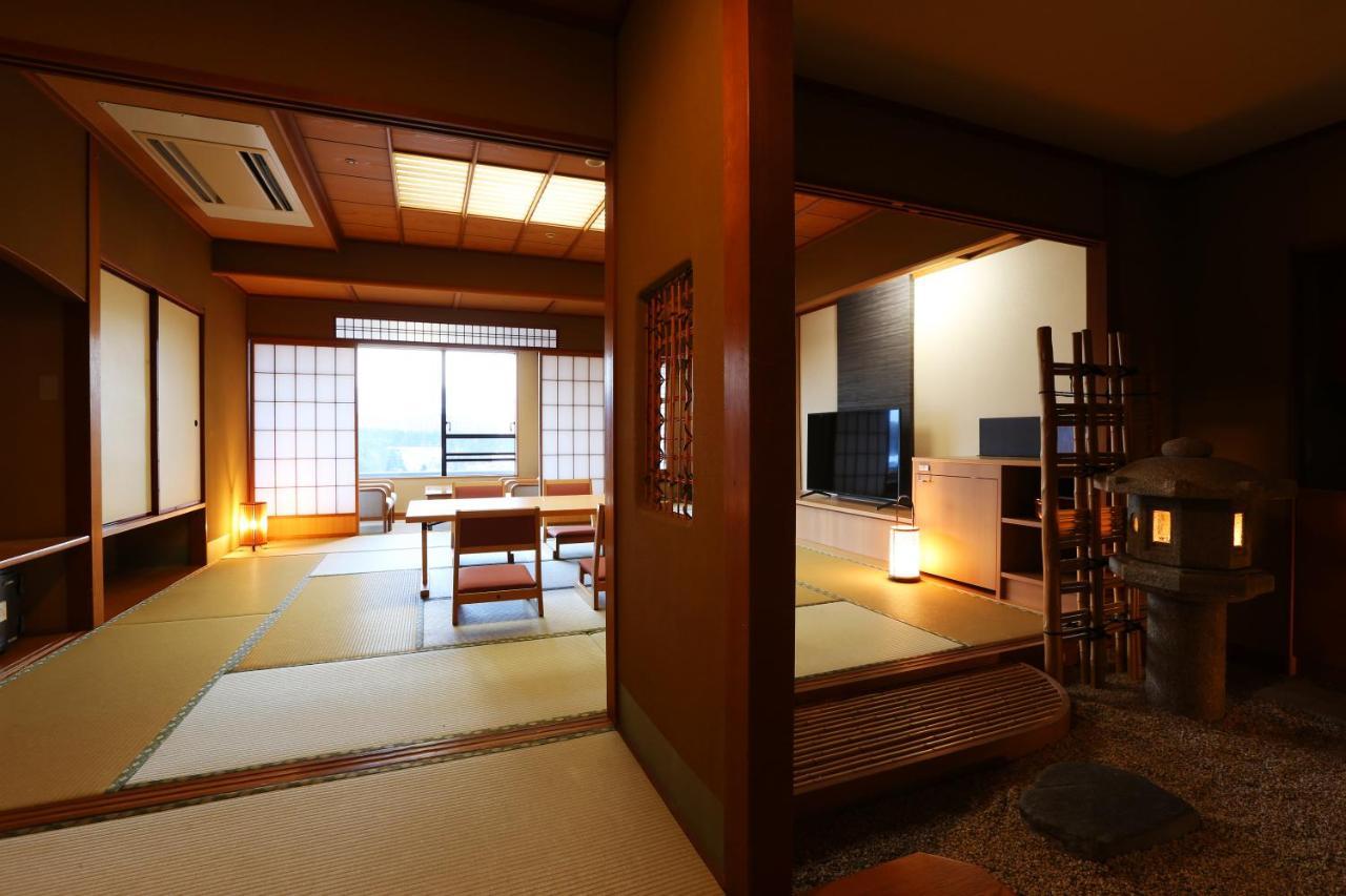 Hotel Sakurai Kuszacu Kültér fotó